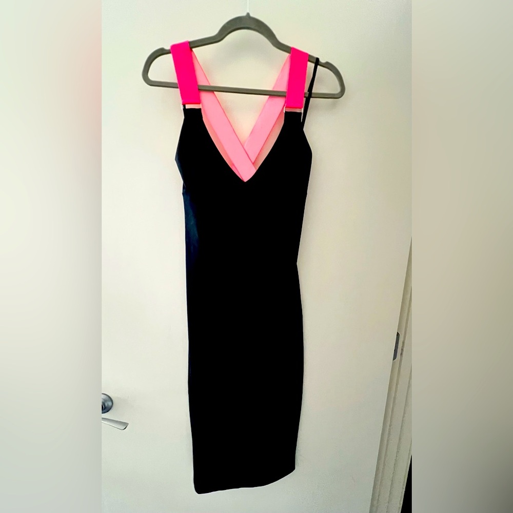 Black Bebe fitted midi dress with back neon details size medium